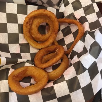 The Burger Shack - Chantilly - What's left of the onion rings. They were put on our table maybe 2 minutes ago. - Hot Dogs Near Me - Chantilly, Virginia