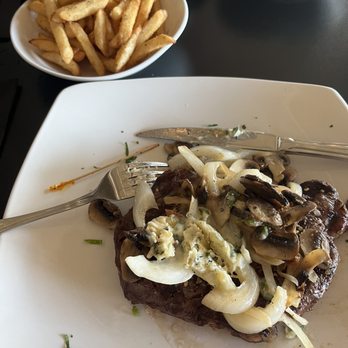 Carnivore - Hand trimmed rib-eye with mushrooms, onions and garlic-herb butter. French fries for my side item. - Steakhouses Near Me - St. Louis, Missouri Carnivore - Hand trimmed rib-eye with mushrooms, onions and garlic-herb butter. French fries for my side item. - Steakhouses Near Me - St. Louis, Missouri