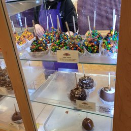 a display of chocolate covered desserts