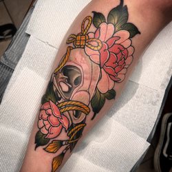 Anchor Rose Tattoo and piercing