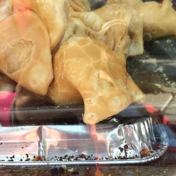 Marché Noor - a tray of dumplings in a glass case - Grocery Near Me - Montreal, Quebec Marché Noor - a tray of dumplings in a glass case - Grocery Near Me - Montreal, Quebec