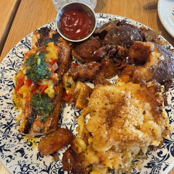 Tupelo Honey Southern Kitchen & Bar - Blackened Mahi-Mahi (GF) - New American Near Me - Irving, Texas Tupelo Honey Southern Kitchen & Bar - Blackened Mahi-Mahi (GF) - New American Near Me - Irving, Texas
