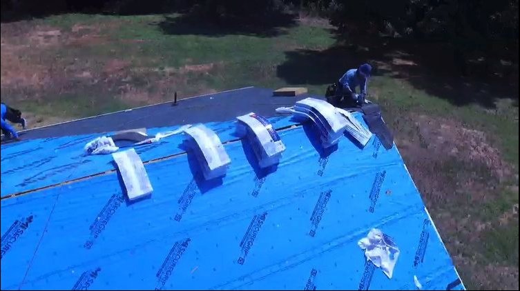 Slide of Heritage Roofing