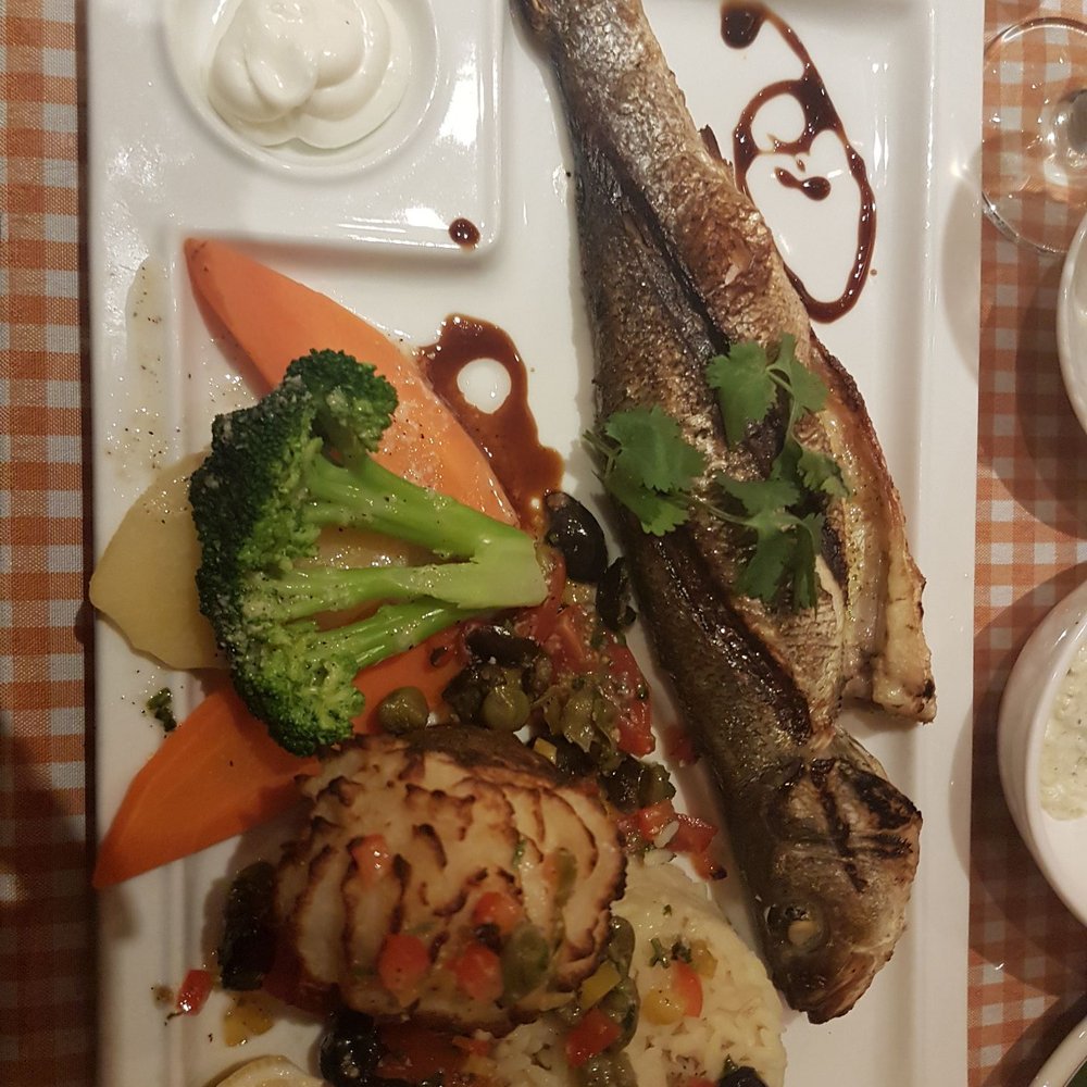 Le Petit Pêcheur - Grilled fish and baked potato - Seafood Near Me - Montreal, Quebec Le Petit Pêcheur - Grilled fish and baked potato - Seafood Near Me - Montreal, Quebec