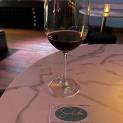 Salute Wine and Beer Lounge - 2 oz pour of red wine