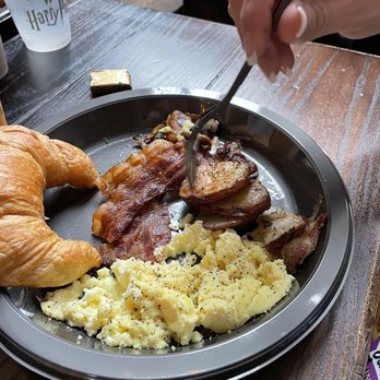 Leaky Cauldron™ - Eggs, Potato, Bacon, Croisant - British Near Me - Orlando, Florida
