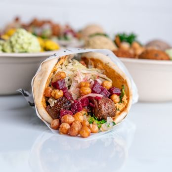 Hummus Republic - a burrito and a bowl of guacamole - Mediterranean Near Me - Scottsdale, Arizona Hummus Republic - a burrito and a bowl of guacamole - Mediterranean Near Me - Scottsdale, Arizona