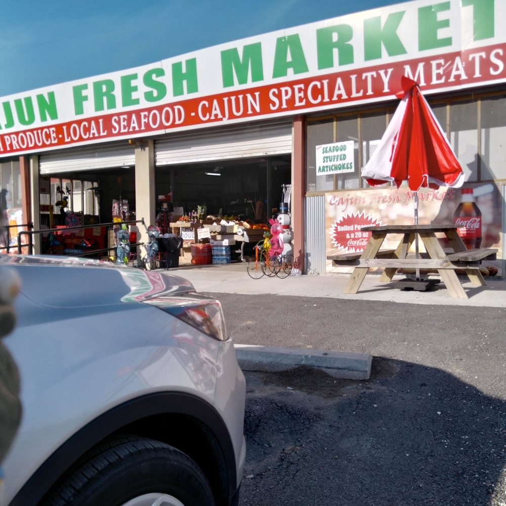 Cajun Fresh Market - a car parked in front of a store - Specialty Food Near Me - Raceland, Louisiana