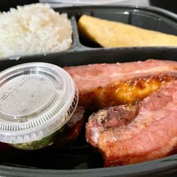 Nyob Zoo Cafe - Pork belly entree with an eggroll and spicy chili pepper dip