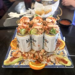 Hacienda Vieja Mexican Grill - CHAROLAZO: Choice of 6 beers - topped with shrimp, octopus, shrimp ceviche, cucumber, chamoy and hot sauce.