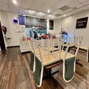 Shaking Bowl - a table and chairs in a restaurant - Japanese Near Me - St. Louis, Missouri