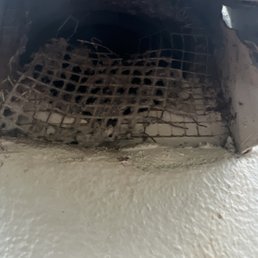 Old material jammed back in the vent.