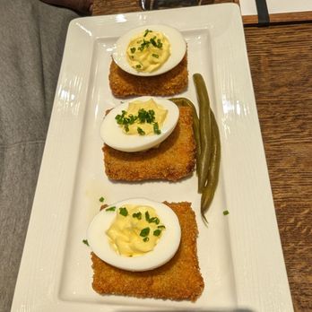 Couvant - Hard boiled egg and fried pork under.... delicious - Brasseries Near Me - New Orleans, Louisiana