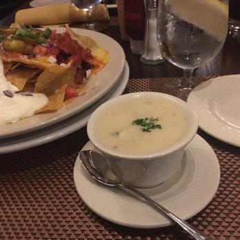 The Tavern - Seafood Chowder and nachos in the background - American Near Me - Salem, Massachusetts