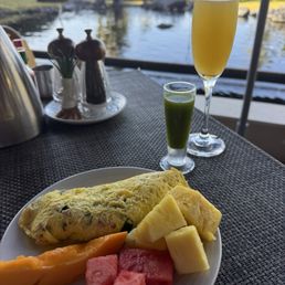 Omelet, fresh fruit, mimosa
