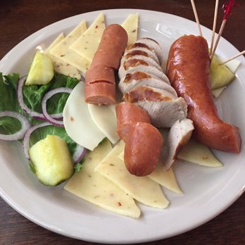 Schilo's - Schilo's Sampler: cheddarwurst, bratwurst, polish with pepper jack and provolone cheese. - Delis Near Me - San Antonio, Texas