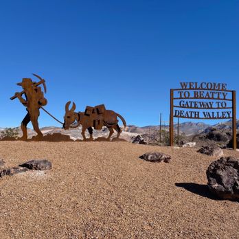Gema's Cafe - a sign with a man and two animals - Coffee & Tea Near Me - Beatty, Nevada Gema's Cafe - a sign with a man and two animals - Coffee & Tea Near Me - Beatty, Nevada