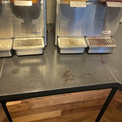 Closer look at the drink spills and stickiness that employees did not take the initiative to clean even after seeing it
