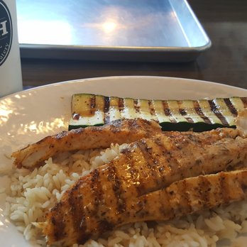 California Fish Grill - Sea bass cajun with grilled zucchini and white rice :) - Seafood Near Me - Brea, California
