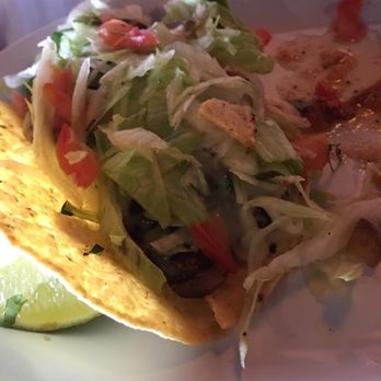 La Parrilla - Broken taco shell propped with a lime! Terrible - Mexican Near Me - Lisle, Illinois