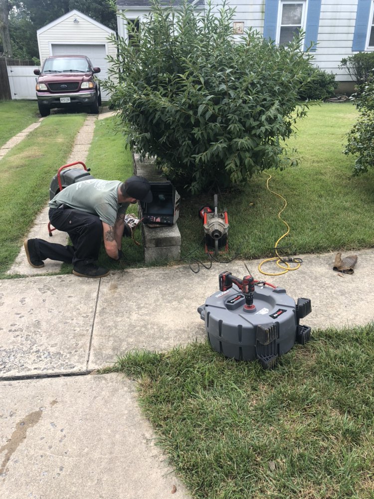 Slide of Shuster's Plumbing & Drain Cleaning