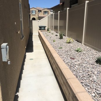 Del Rio Landscape - Finished side yard with plants and rock - Landscaping Near Me Del Rio Landscape - Finished side yard with plants and rock - Landscaping Near Me