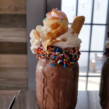 The Sweet Spot - a chocolate milkshake with whipped cream and sprinkles - Desserts Near Me - St. Augustine, Florida The Sweet Spot - a chocolate milkshake with whipped cream and sprinkles - Desserts Near Me - St. Augustine, Florida