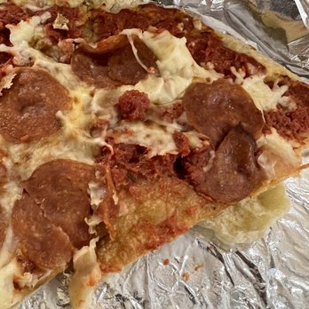 Red Velvet Underground - a slice of pepperoni pizza - Bars Near Me - Albuquerque, New Mexico