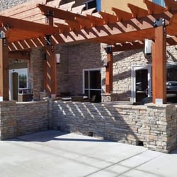 A Cut Above - Pressure treated/stained pergola built in stone finished cmu walls & columns