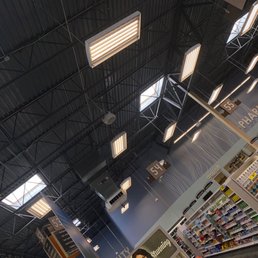 a woman standing in a grocery store