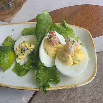 Monkeypod Kitchen - Devied eggs with lobster - Tacos Near Me - Honolulu, Hawaii Monkeypod Kitchen - Devied eggs with lobster - Tacos Near Me - Honolulu, Hawaii