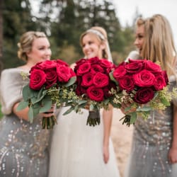 The different red roses she chose gave depth to our bouquets