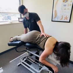 MVP Chiropractic - Dr. Kyle Bastean doing Flexion Distraction on patient at MVP Chiropractic and Physical Therapy in New Lenox