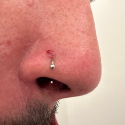 Body Art World Tattooing - It's trying to heal at least but it was one big hole!