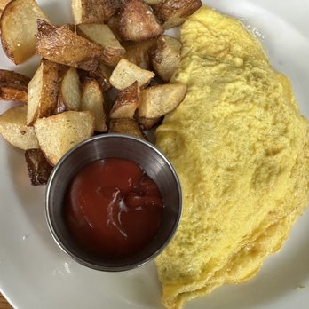 Irregardless Cafe - Omelette & home fries - New American Near Me - Raleigh, North Carolina Irregardless Cafe - Omelette & home fries - New American Near Me - Raleigh, North Carolina
