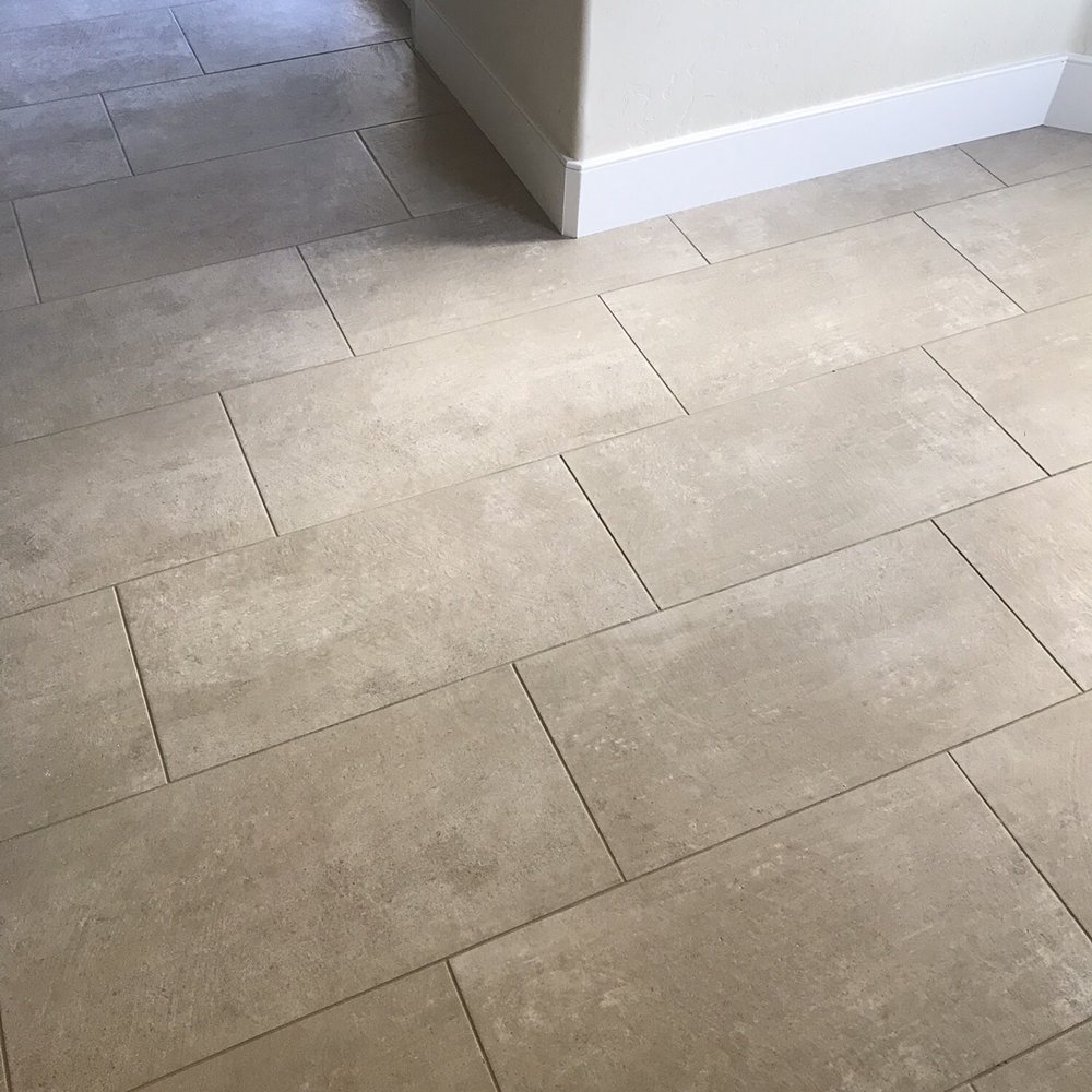 Aztec Tile & Granite - Seamless transition from tile to baseboards. - General Contractors Near Me