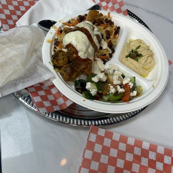 In & Out Donair - Lamb shank platter. Do tasty and their hot sauce is so good! Its got heat - Fast Food Near Me - Vancouver, British Columbia In & Out Donair - Lamb shank platter. Do tasty and their hot sauce is so good! Its got heat - Fast Food Near Me - Vancouver, British Columbia