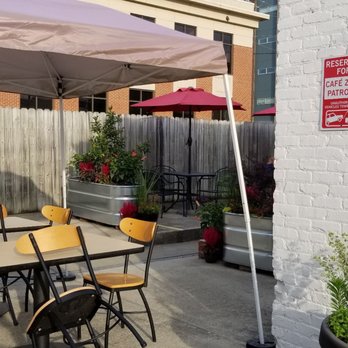 Cafe Zata - a patio with tables and chairs - Coffee & Tea Near Me - Richmond, Virginia