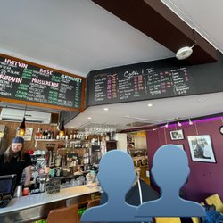 Løvetann Kaffebar - The inside of the cafe with drinks menu