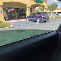 a car parked in a parking lot a car parked in a parking lot