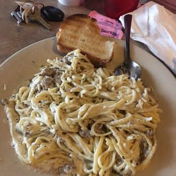 Pasta J's Bryant - a plate of pasta and toast - Italian Near Me - Bryant, Arkansas Pasta J's Bryant - a plate of pasta and toast - Italian Near Me - Bryant, Arkansas