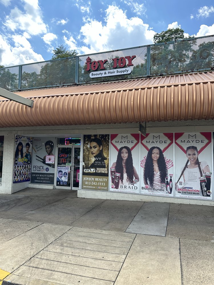 Joy Joy Beauty Supply Logo