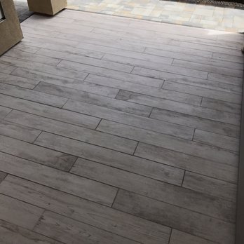 Nine Orange Landscaping - We tiled in front of our back porch so that it matches our tiles indoors. - Landscaping Near Me Nine Orange Landscaping - We tiled in front of our back porch so that it matches our tiles indoors. - Landscaping Near Me
