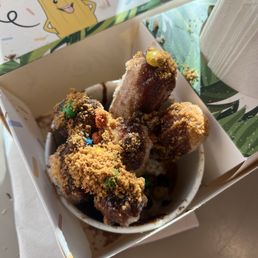 Churroaddict with Chocotella filling, Chocolate Drizzle, Biscoff, and Mini M&Ms Churroaddict with Chocotella filling, Chocolate Drizzle, Biscoff, and Mini M&Ms