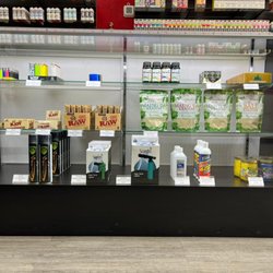 Product - Smoke shop essentials like lighters, RAW rolling papers, kratom, butane, and more.