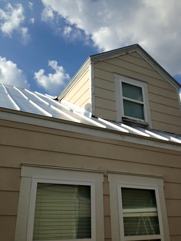 Slide of Bow Tie Roofing Systems