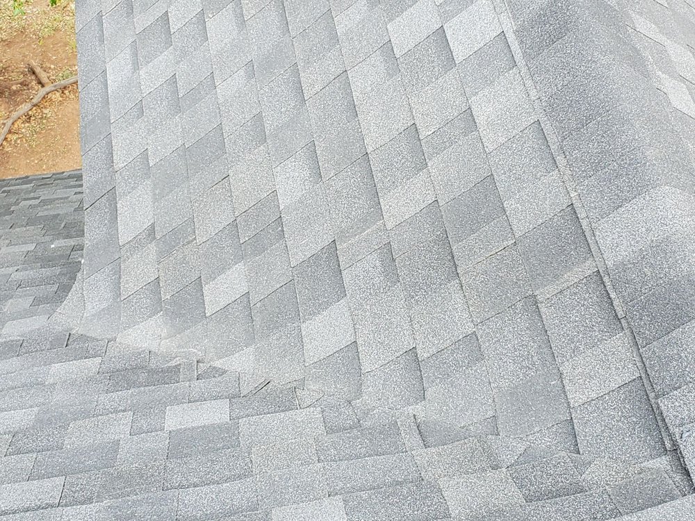 Slide of L&W Roofing