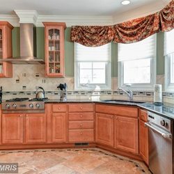 A Stitch In Time - Kingston Valances in a bay window over Silhouettes in a kitchen