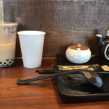 Noodle Man - Bubble milk tea, water in paper cup, chili paste and oil, vinegar. - Noodles Near Me - Happy Valley, Oregon Noodle Man - Bubble milk tea, water in paper cup, chili paste and oil, vinegar. - Noodles Near Me - Happy Valley, Oregon