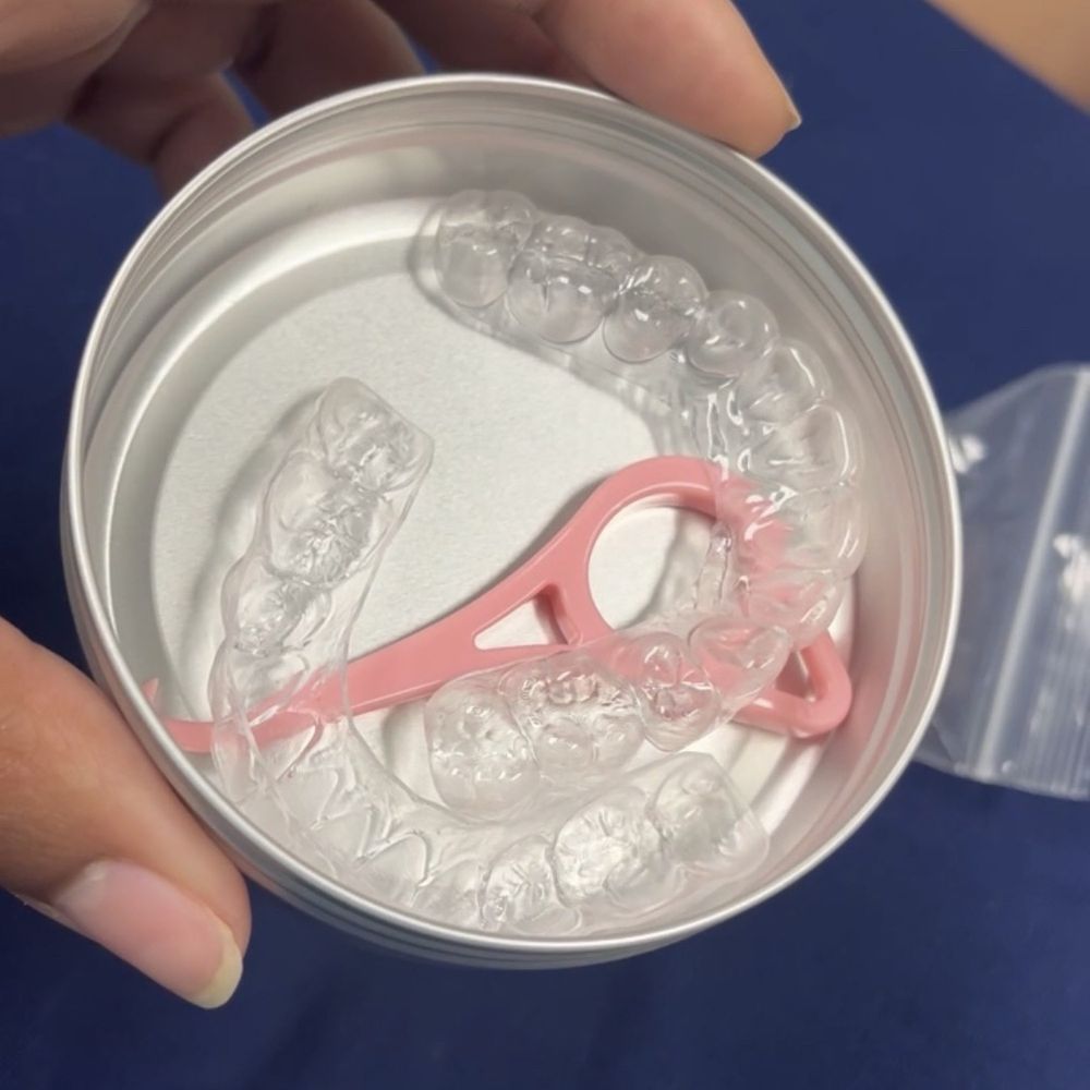 Fagin Orthodontics - My retainers along with a case to hold them in and a tool to assist taking them off - Orthodontists Near Me - Fresno, California Fagin Orthodontics - My retainers along with a case to hold them in and a tool to assist taking them off - Orthodontists Near Me - Fresno, California